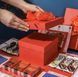 Червона коробка-сюрприз із кейсом для грошей та фото для оригінального подарунка P13050 фото 3