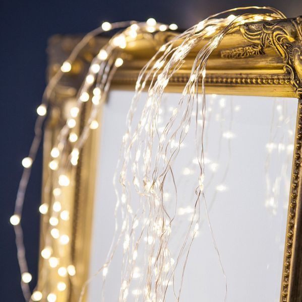 Світлодіодна гірлянда Роса 200 LED тепле біле живлення від батарейок з пультом 2м 10 ниток G03056 фото